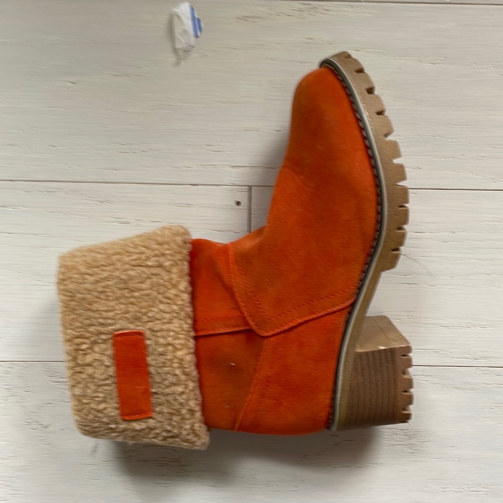 Never worn orange boots
